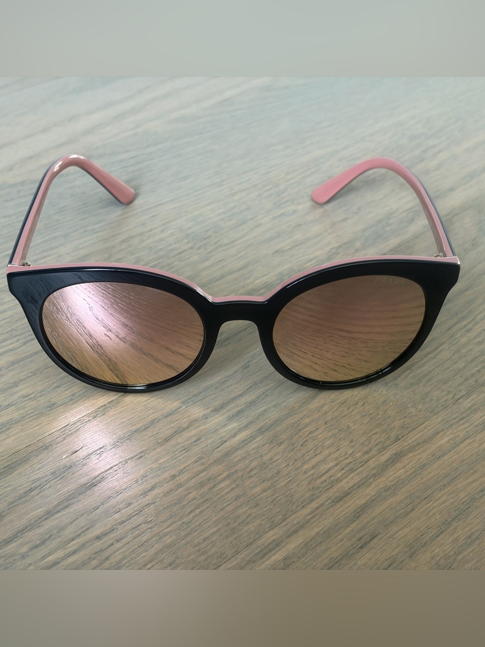 Prada Round Sunglasses - Black Frame with Pink Lenses